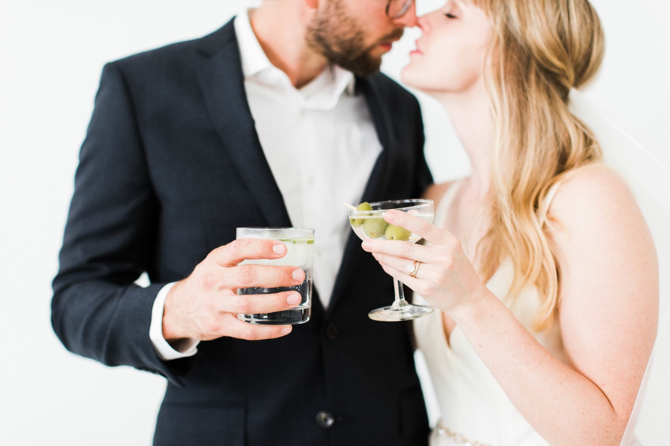 Couple toasting with cocktails